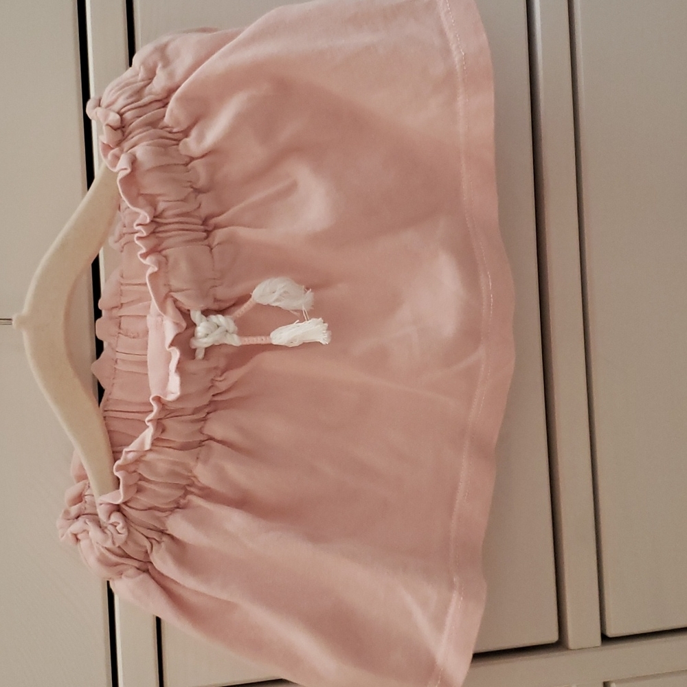 Baby GAP pink and floral skirt with attached shorts. 12-18 months.